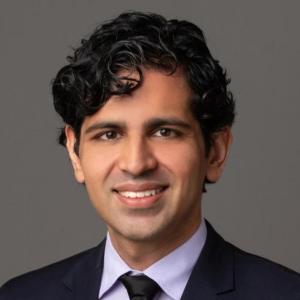 A photo of a young man with black hair