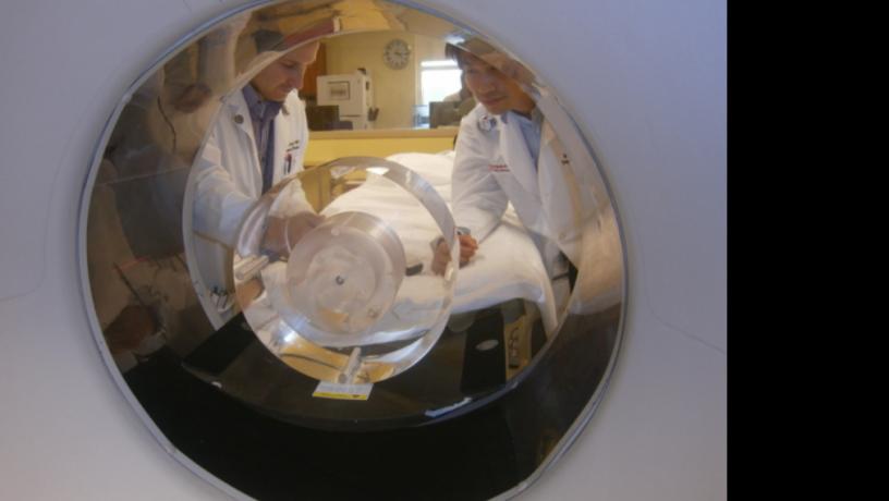 two students using an MRI machine