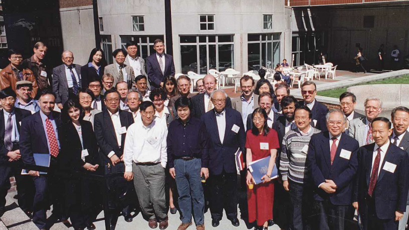 A large group of people standing outside a building