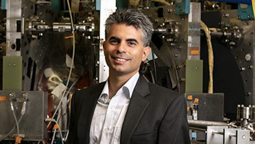 A photo of a middle aged man in a lab