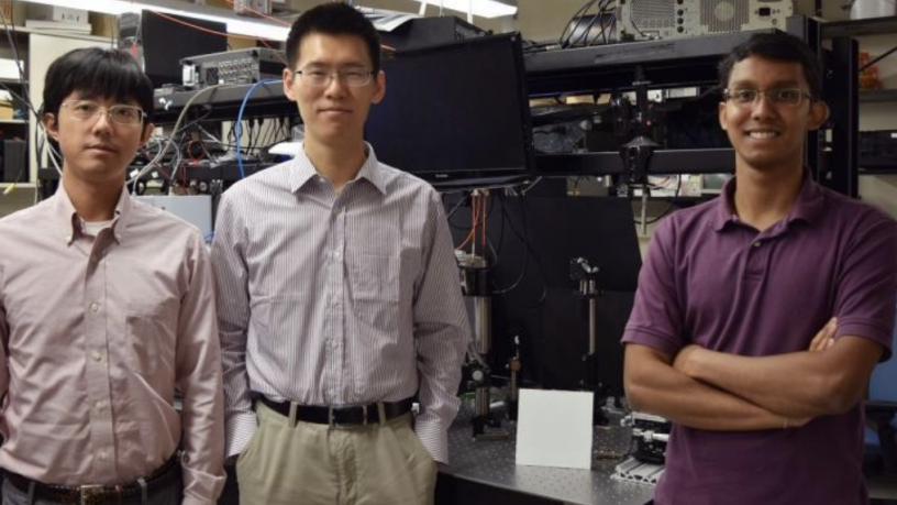 two faculty members and a student