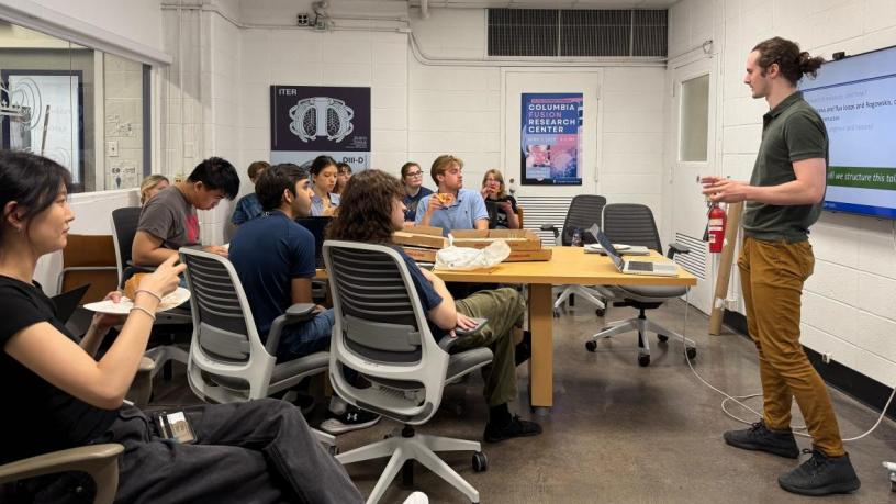 On e student standing in front of a group of seating students in a classroom