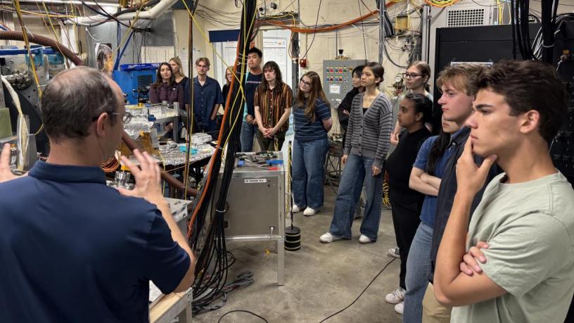 A group of people touring a lab