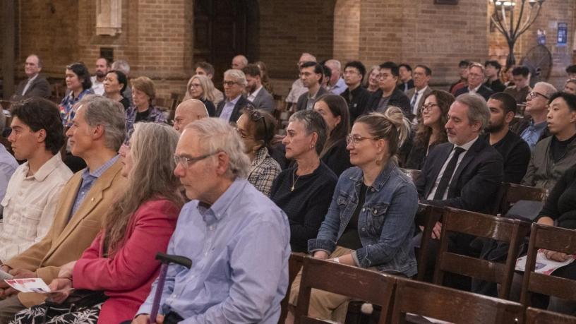 people sitting in a chapel