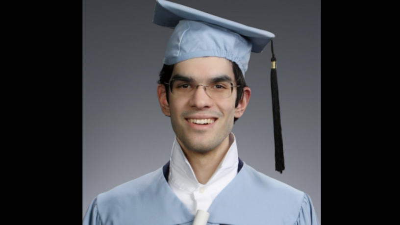 a photo of a man in commencement regalia