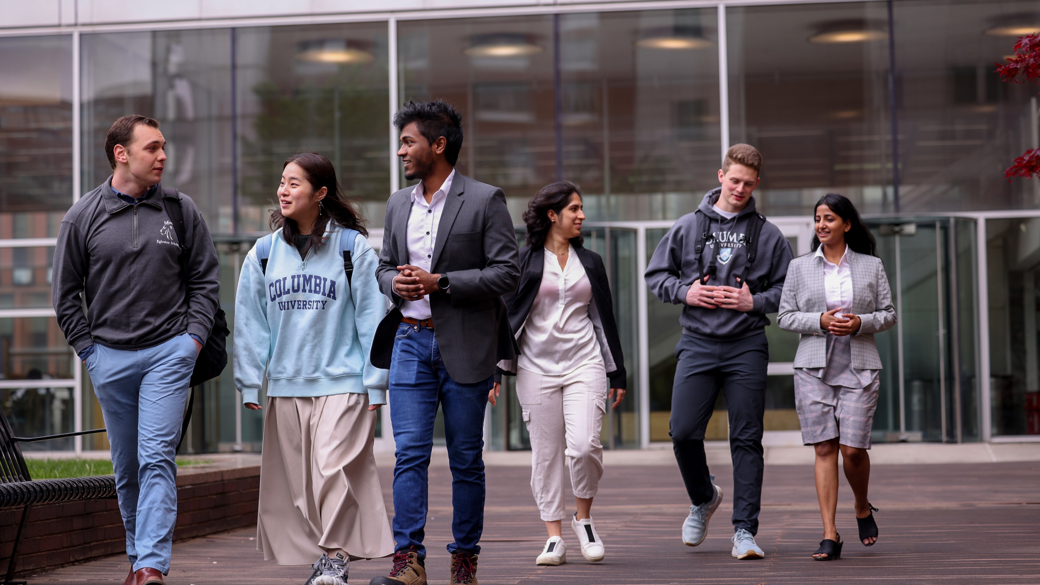 Orientation at Columbia Engineering -- students walking and talking on campus