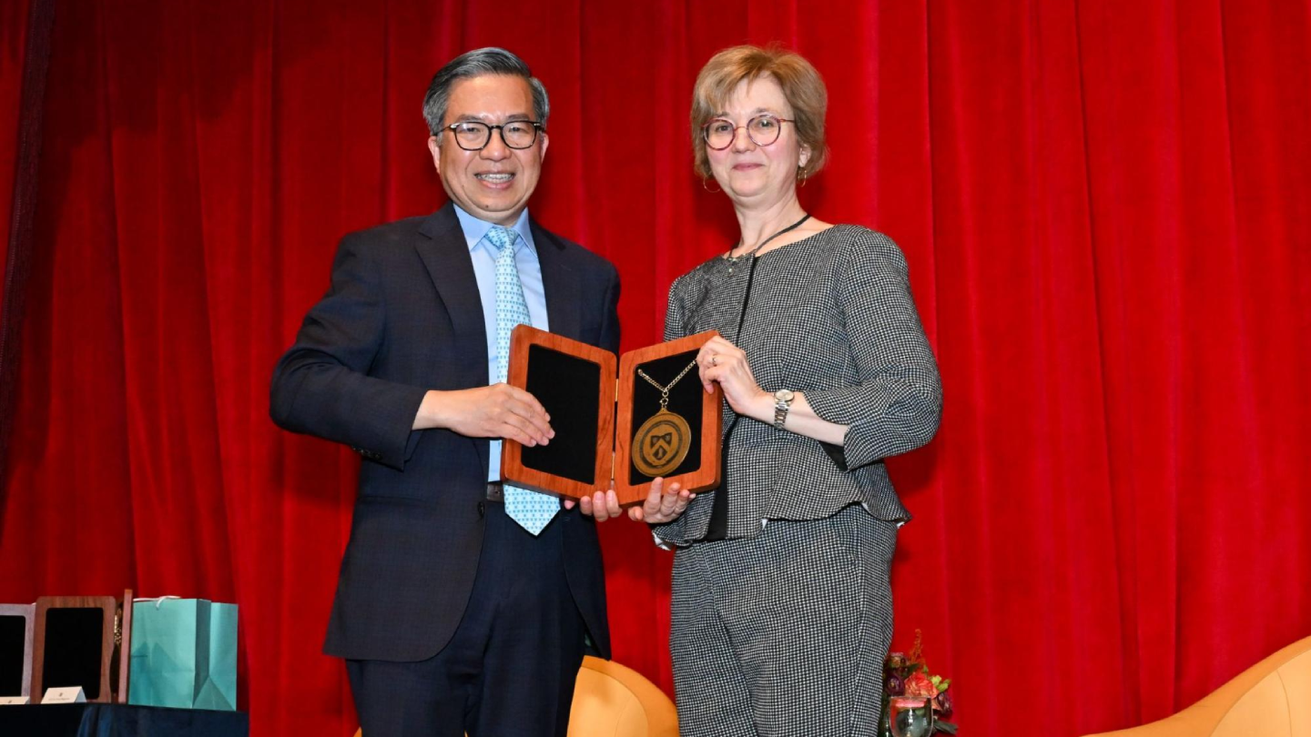 Dean Chang with Liliana Borcea, George P. Livanos Professor of Applied Physics and Applied Mathematics.