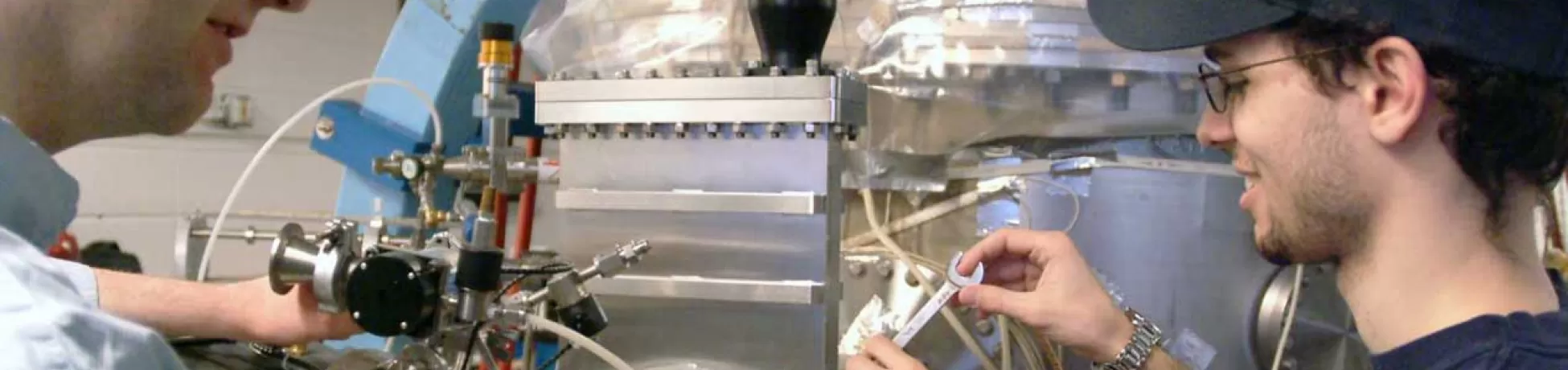 Student with a faculty member in a lab