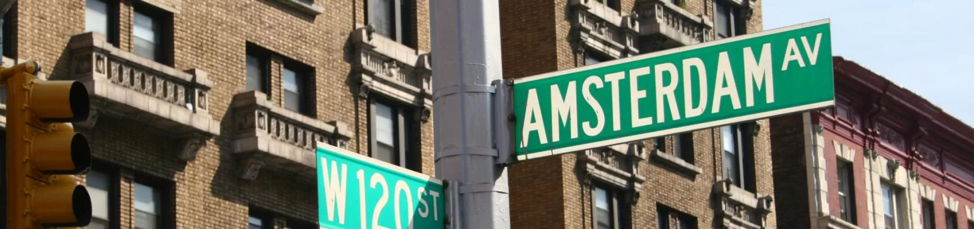 Street sign at the intersection of W 120 St. and Amsterdam Av.