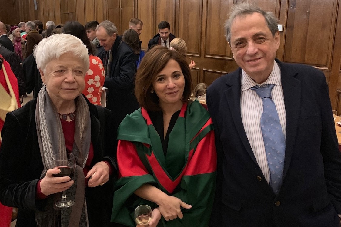 Michal Lipson (center), taken in 2018 when she received an honorary doctorate from Trinity College, University of Dublin; pictured with her father (right) and partner. 